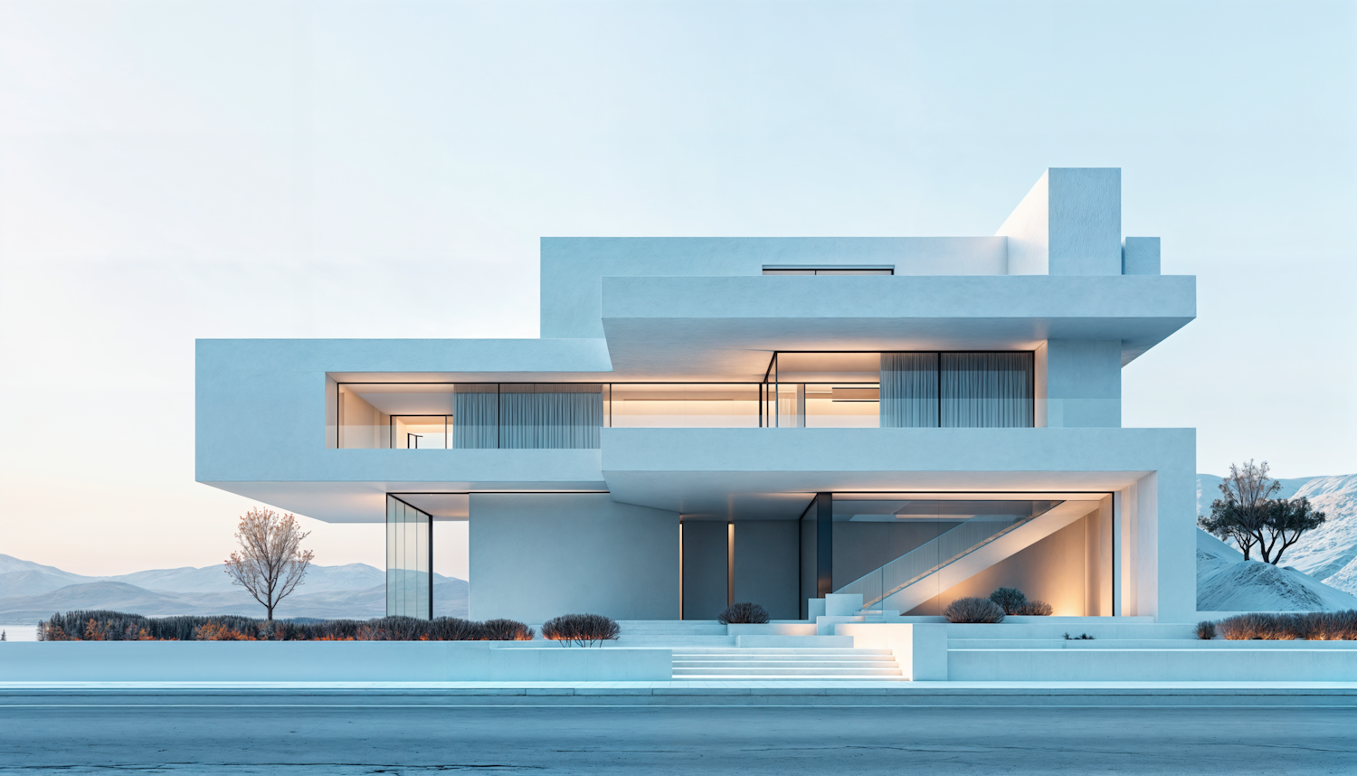 Two-story white modern house with cantilevered upper floors and lit windows at dusk